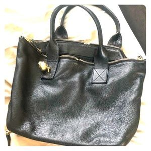 Alexander McQueen black leather handbag